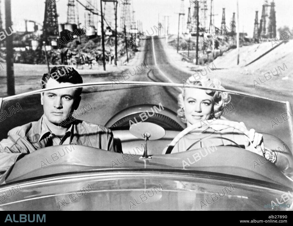 DOROTHY MALONE and ROCK HUDSON in WRITTEN ON THE WIND, 1956, directed by DOUGLAS SIRK. Copyright UNIVERSAL PICTURES.