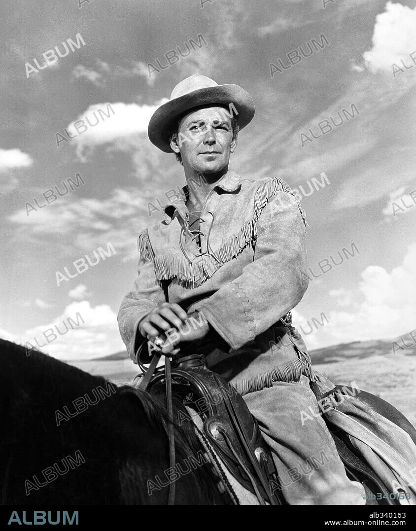 ALAN LADD dans SHANE, 1953, réalisé par GEORGE STEVENS. Copyright PARAMOUNT PICTURES.