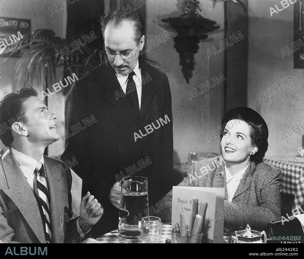 FRANK SINATRA, GROUCHO MARX and JANE RUSSELL in DOUBLE DYNAMITE, 1951, directed by IRVING CUMMINGS. Copyright RKO.