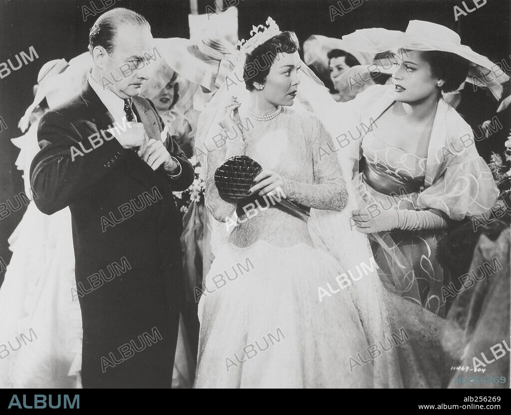 ALEXIS SMITH and JANE WYMAN in HERE COMES THE GROOM, 1951, directed by FRANK CAPRA. Copyright PARAMOUNT PICTURES.