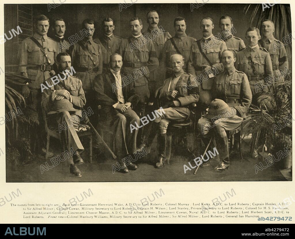 'Lord Roberts and Sir Alfred Milner with their Personal Staffs', December 1900, (1901). Group portrait of British officers taken at Government House, Cape Town, South Africa, during the Second Boer War. Back row: Lieutenant Hereward Wake; Colonel Murray; Lord Kerry; Captain Henley; Colonel Cowan, Military Secretary; Captain H Wilson; Lord Stanley, Private Secretary; Colonel Sir HS Rawlinson, Assistant-Adjutant-General; Lieutenant Chester-Master; Lieutenant Cowan; Lord Herbert Scott. Front row: Colonel Hanbury Williams, Military Secretary; Sir Alfred Milner; Lord Roberts (with arm in sling); General Ian Hamilton. From "The Life and Deeds of Earl Roberts, Vol. IV. - To Lord Roberts's Reign in Pall Mall", by J. Maclaren Cobban. [T. C. & E. C. Jack, Edinburgh, 1901].