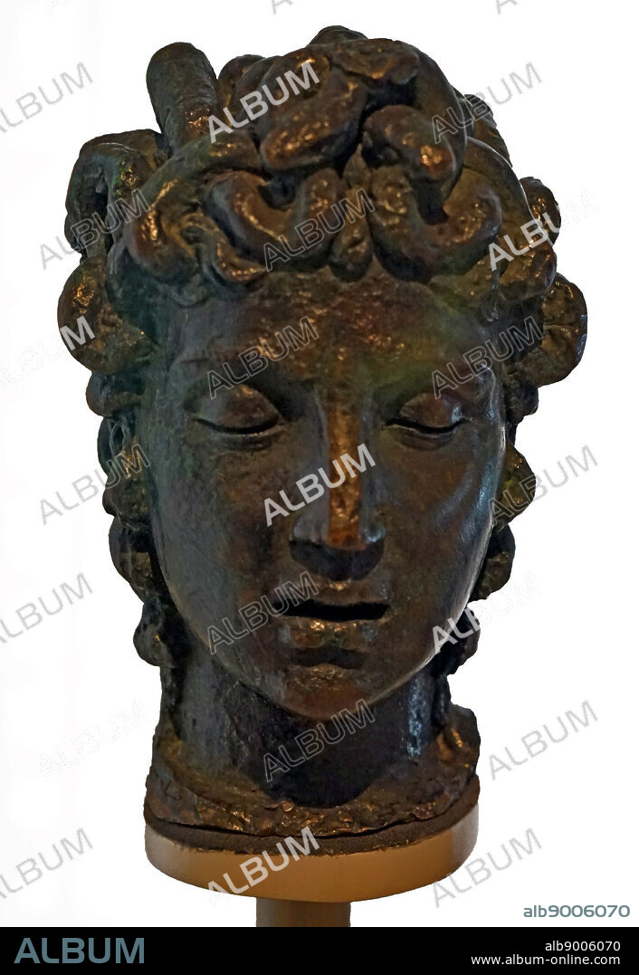 Bronze head of Medusa by Benvenuto Cellini (1500-1671) an Italian goldsmith, sculptor, draftsman, soldier, musician, and artist. Dated 16th Century.