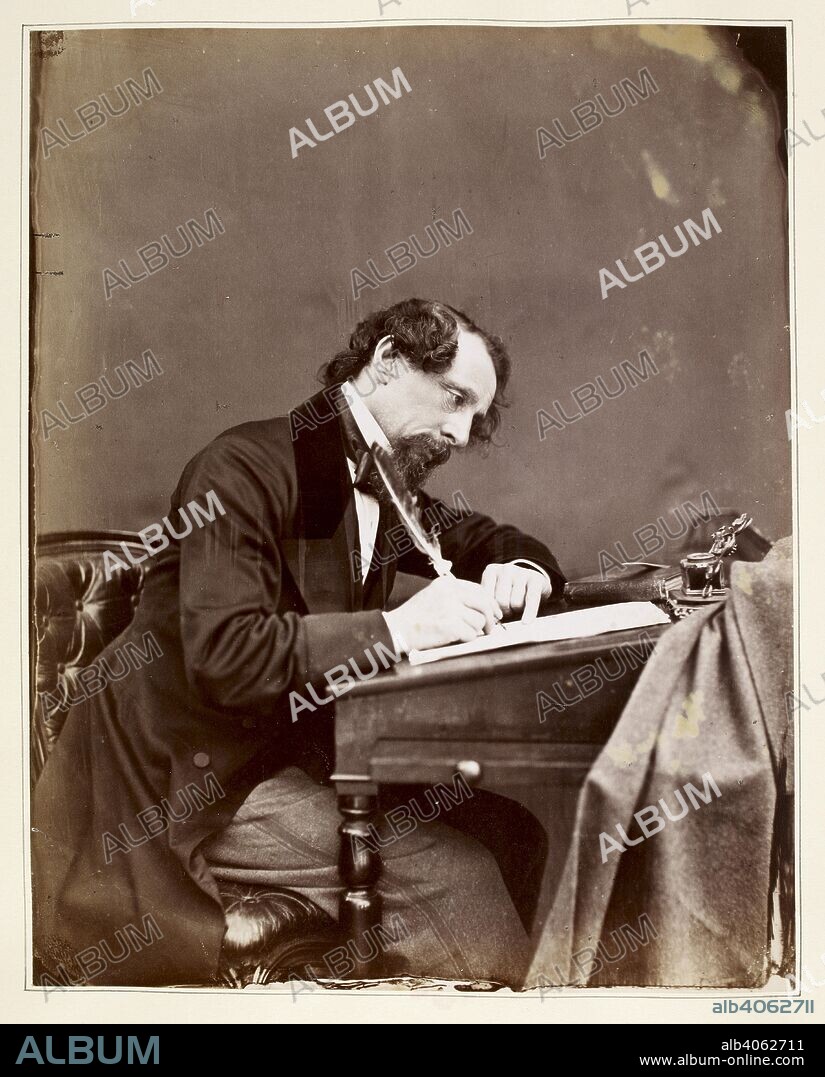 JOHN FORSTER. Charles Dickens sitting at his writing desk. The life of Charles Dickens. London: Chapman & Hall, 1872-74. Source: Dex.316 f.129.
