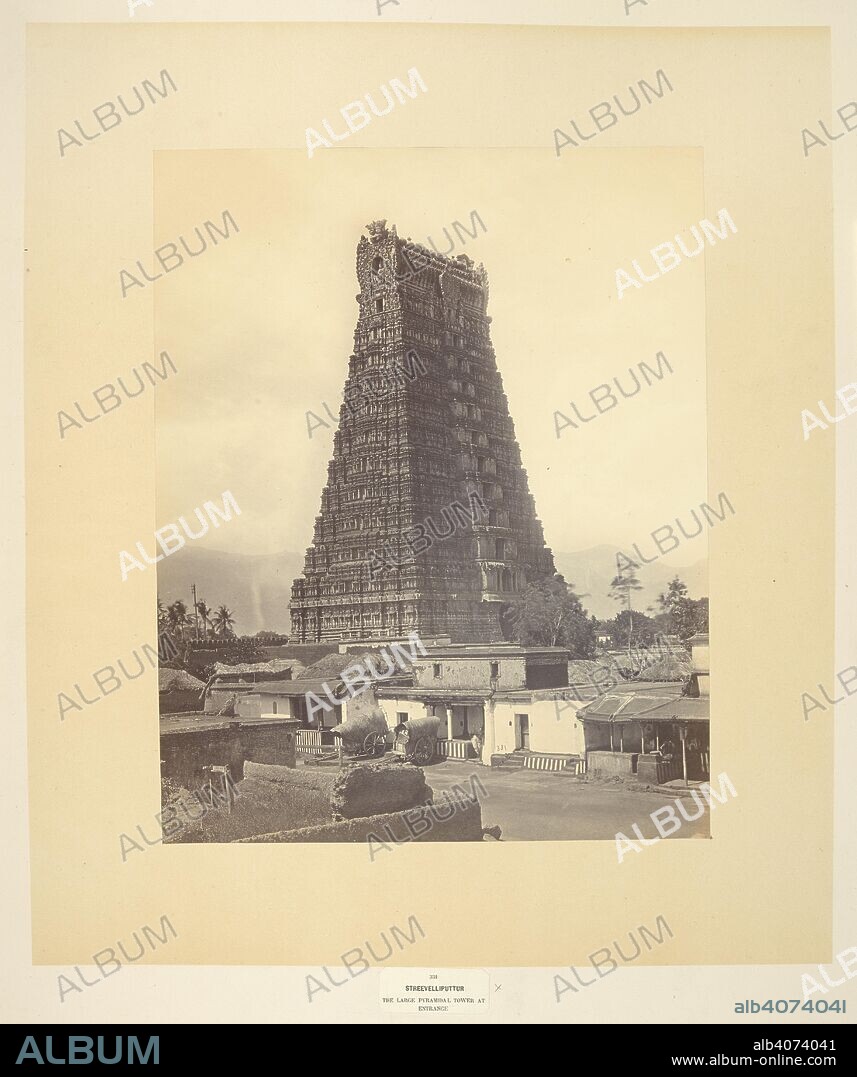 EDMUND DAVID LYON. Streevelliputtur [Srivilliputtur]. The large pyramidal tower at entrance. View looking towards entrance gopura of temple. This Gateway, which is considered one of the finest and best proportioned in Southern India, is well seen in this Photograph, which is taken from an excellent point of view. It is nearly 200 feet high, the pyramidal part of the tower being of brick and plaster, rises through eleven storeys exclusive of the base and the waggon-shaped roof. It is not only particularly pleasing in form, but elegant in its details, figure sculpture being only sparingly used, and then only where its presence is conducive to the general effect. Its design is somewhat marred by the open colonnade on each side of the central range of windows having been built up in modern times, and now presenting flat unmeaning surfaces where originally there was relief and shadow. In the view may be seen two of the country carts, which are drawn by bullocks, and are in use all over the Madras Presidency. Streevelliputtur [Srivilliputtur]. The large pyramidal tower at entrance. c.1868. Source: Photo 212/3.(1).