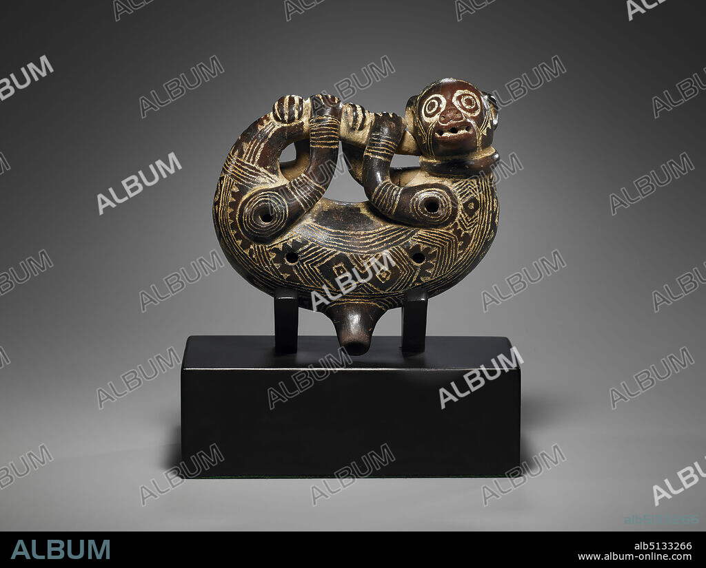 Ocarina in the Shape of a Kinkajou, Incised ceramic with pigment, Castillo engraved, 11.43 × 15.24 cm (4 1/2 × 6 in.), This kinkajou is shown doing what it does best: hanging. It uses its tail here as it would the limb of a tree. The pose makes the figure easy to hold and use as an ocarina (whistle). The hip and shoulder joints, as well as its flanks, have tone holes. The mouthpiece projects from the center of its back. The kinkajou, also called the honey bear, is a member of the raccoon family. , Made in Costa Rica, Costa Rica, Carrillo, Nicoya, 13th16th century, Musical Instruments.