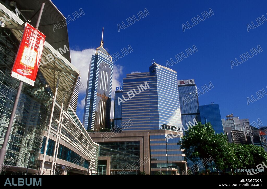 China: Hong Kong Convention and Exhibition Centre (HKCEC) and the Central Plaza building next to Victoria Harbour, Wan Chai, Hong Kong Island.<br/><br/>. Originally a sparsely populated area of farming and fishing villages, Hong Kong has become one of the world's most significant financial centres and commercial ports. It is the world's tenth-largest exporter and ninth-largest importer.