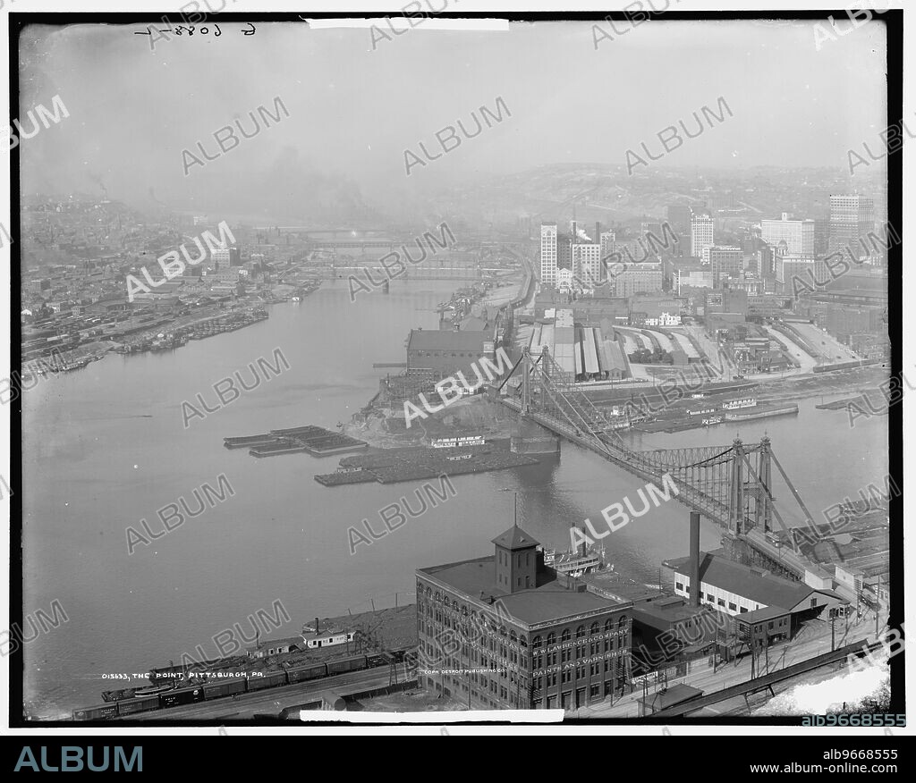 The Point, Pittsburgh, Pa., between 1900 and 1915. Industrial scene at the confluence of the Allegheny and Monongahela rivers, W. W. Lawrence & Company Paints and Varnishes warehouse and boxcars in the foreground.