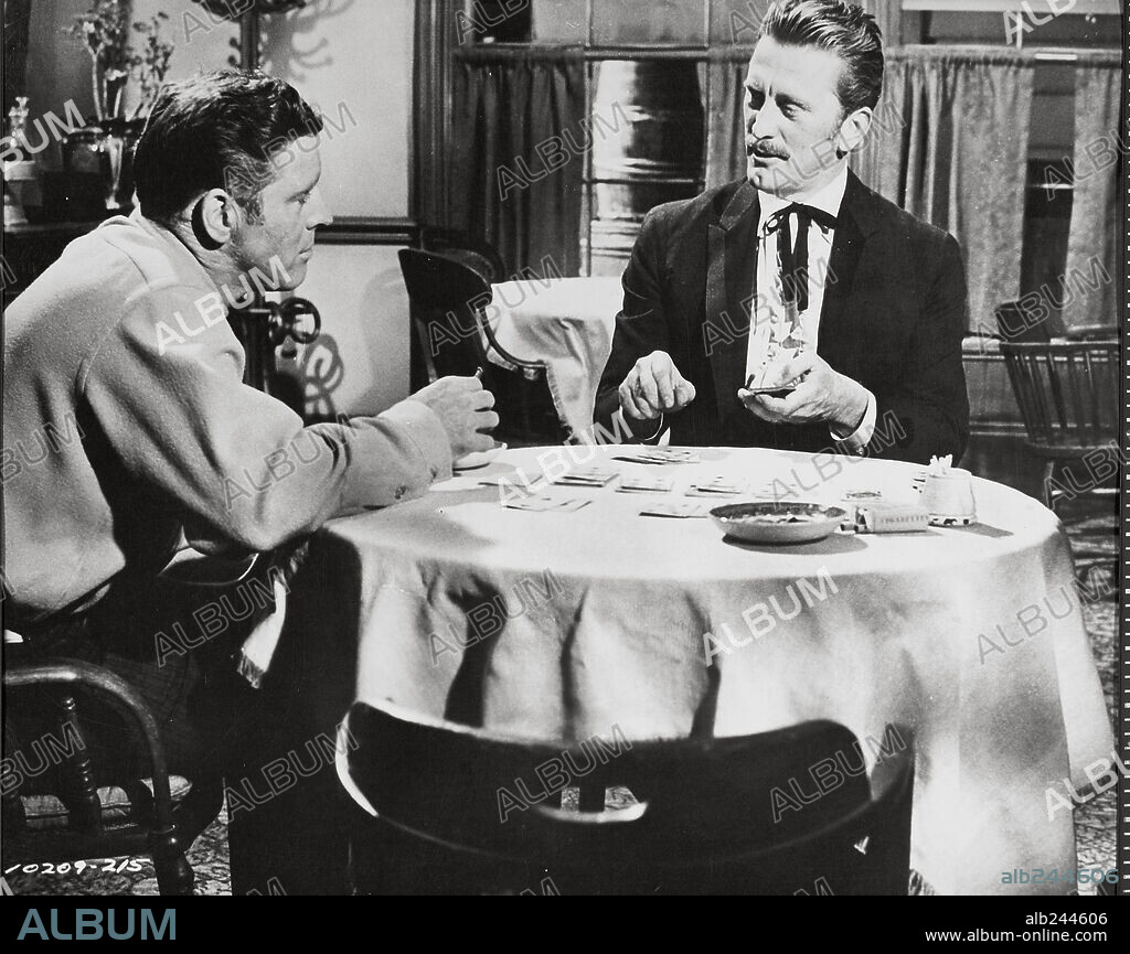 BURT LANCASTER and KIRK DOUGLAS in GUNFIGHT AT THE O. K. CORRAL, 1957, directed by JOHN STURGES. Copyright PARAMOUNT PICTURES.