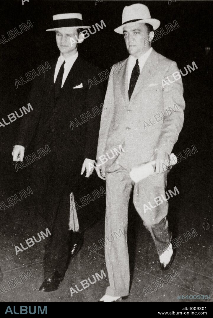 J Edgar Hoover, chief of the FBI, with head of the Chicago office Melvin Purvis, USA, mid 1930s. John Edgar Hoover (1895-1972) was appointed Director of the Bureau of Investigation (renamed the Federal Bureau of Investigation in 1935) in 1924. In 1932 he made Melvin Horace Purvis (1903-1960) head of the Chigago office, where he was tasked with taking on some of America's most notorious gangsters, including John Dillinger. His successes and resultant high profile in the media, particularly after Dillinger was killed led to friction with Hoover, and Purvis resigned from the FBI in 1935.
