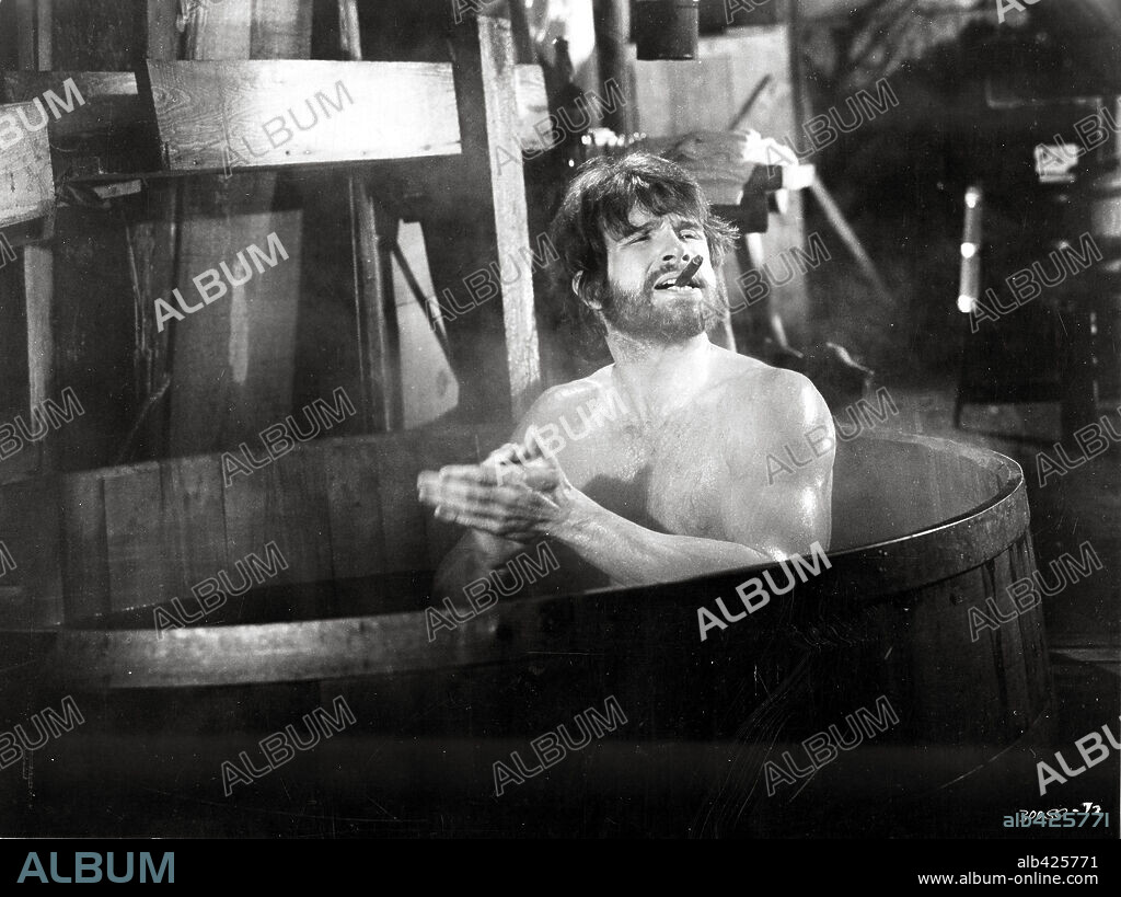 WARREN BEATTY en LOS VIVIDORES, 1971 (MCCABE & MRS. MILLER), dirigida por ROBERT ALTMAN. Copyright WARNER BROTHERS.