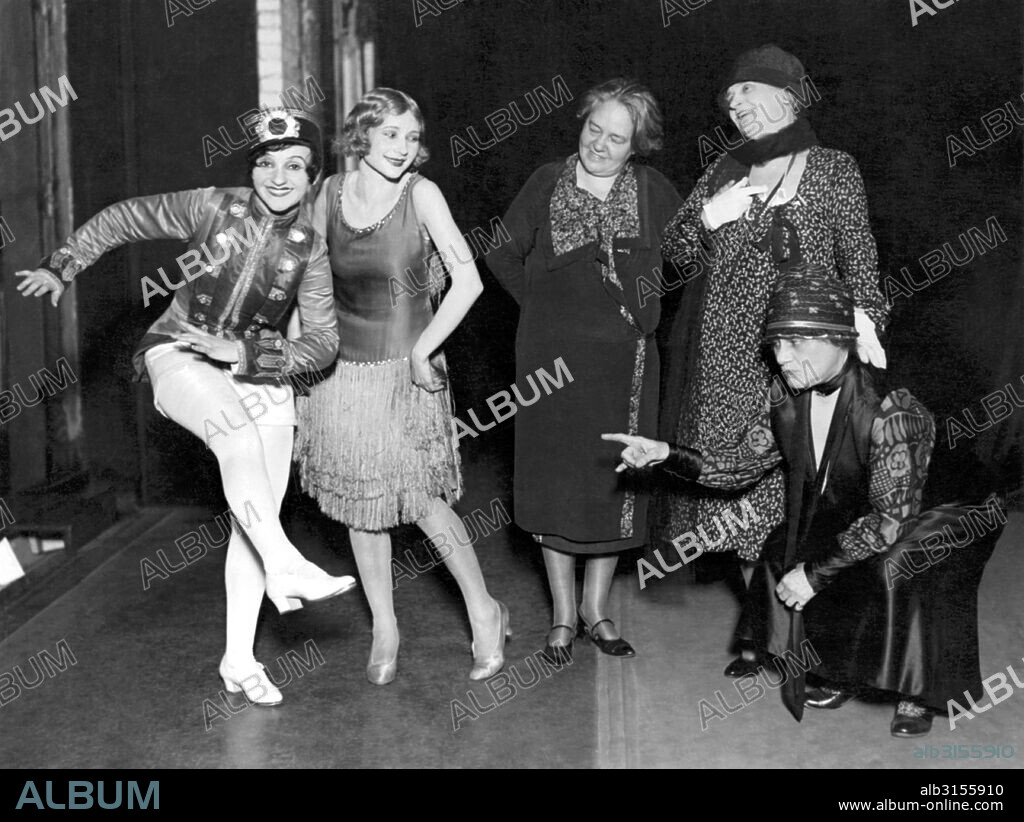New York, New York:  July 8, 1927 Old time stage celebrities  are shown some of the modern dance steps at a special matinee of the 'Grand Street Follies'.  Lilly LuBell and Paula Trueman render some modern moves while veteran  performers Helen Arthur, Henrietta Grossman and Frankie Bailey look on.