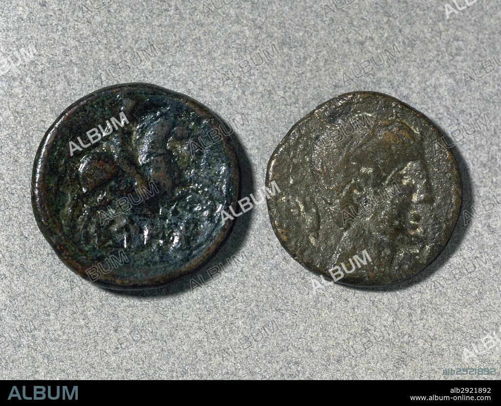 Assarius. Roman Coins. Left. Reverse. As. Ibero-roman. Bronze. Rider with palm. Adverse. As. Ibero-roman. Bronze. Head with amphora.  Mint of Eusti (Caldes de Montbui). History Museum. Sabadell. Catalonia. Spain.