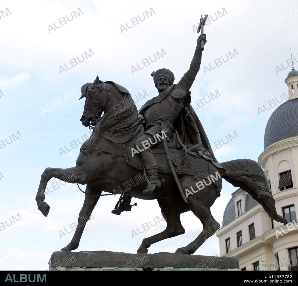 The statue of Mihai Viteazul [Michael the Brave], by French sculptor Albert-Ernest Carrier-Belleus, in University's Square, Bucharest, Romania. Michael the Brave (1558 - 1601), born as Mihai Patrascu, was the Prince of Wallachia (as Michael II, 1593 - 1601), Prince of Moldavia (1600) and de facto ruler of Transylvania (1599 - 1600). He is considered one of Romania's greatest national heroes.