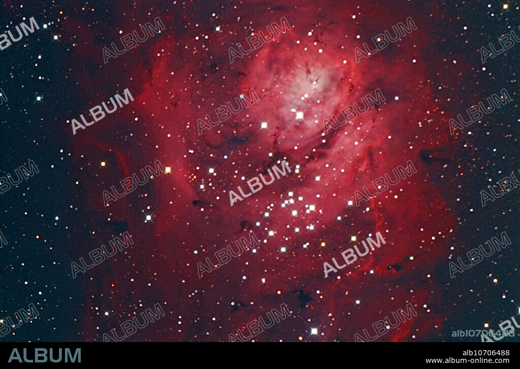 View of the Lagoon Nebula (Messier 8, M8, or NGC 6523), a giant interstellar cloud in the constellation Sagittarius. Photographed using a QHY8 CCD + 16 reflector; 45 minute exposure.