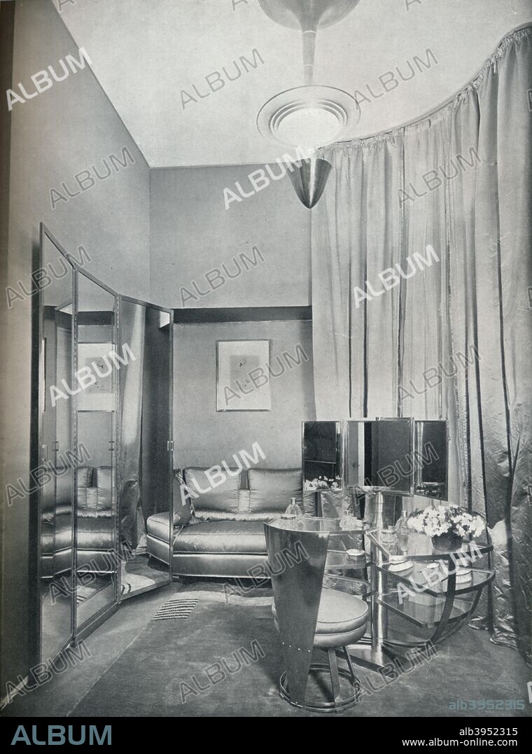 'Part of a boudoir dressing-room in dove grey satin and chromium plated metal, by Eugene Printz of Paris', 1932. A room design by French designer Eugene Printz (1889?1948). From The Studio Volume 103. [London Offices of the Studio, London, 1932].