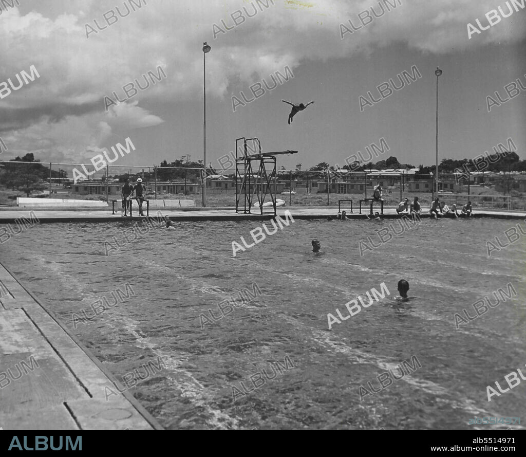 This large swimming pool is typical of the amenities built by the military for servicemen and their dependents. July 20, 1954. (Photo by Edward J. Greenberg, US Army Photo).