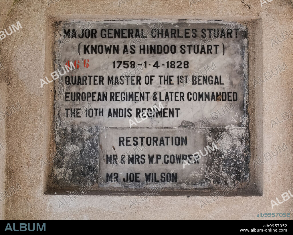 India: Plaque on the tomb of Major General Charles Stuart (1758 - 1828), also known as Hindoo Stuart, in South Park Street Cemetery, a Raj-era graveyard, Kolkata.<br/><br/>. Charles Stuart was well known for embracing Hindu culture and spent his entire adult life in India. He was also known for deploring the attitudes and activities of Christian missionaries who deprecated Indian culture.