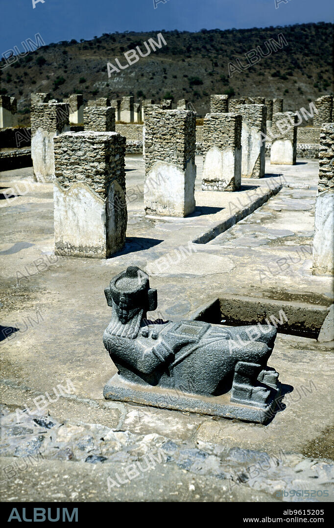 Tula, religious civic center of the Toltec culture founded around 900 AD, under the name Tollan Xicocotitlán, 'Burned Palace', inside of one of the rooms with the rests of pillars and a Chacmool sculpture, related to sacrificial stones or thrones.