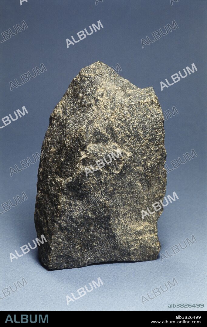 Diabase from Fairfax County, Virginia.  Diabase, also known as dolerite, has a similar chemical structure to basalt, but with larger crystals due to slower cooling.  Dimensions:  6 x 9.5 x 3 cm.