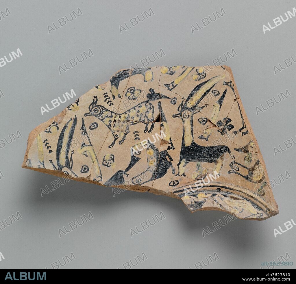 Two Buff Ware Fragments with Animal Decoration. Dimensions: W. 6 1/4 in. (15.9 cm)
L.  4 in. (10.2 cm). Date: 9th century.
The buff clay fabric used to make this vessel forms the background to an overall decoration of animals, including birds and horned and spotted quadrupeds. Interspersed between them are small geometric motifs. None of these features seems to carry a meaning; they were simply a design innovation of the Nishapur potters.