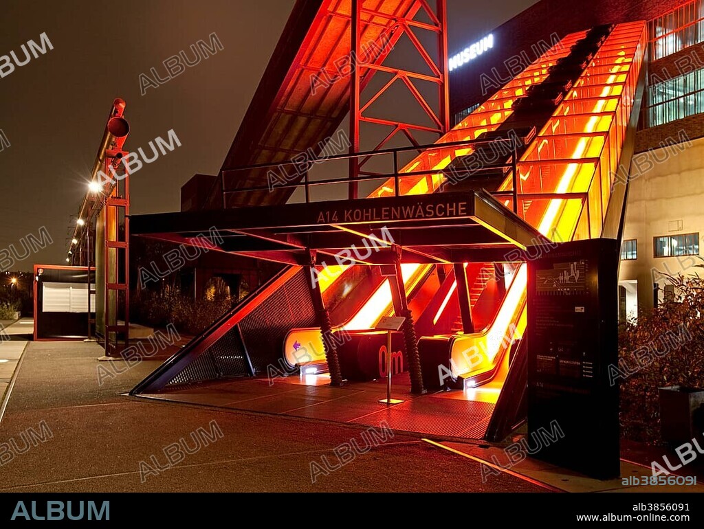 Illuminated gangway to the Ruhr Museum at the Zeche Zollverein Coal Mine Shaft XII, Essen, Ruhr area, North Rhine-Westphalia, Germany, Europe.