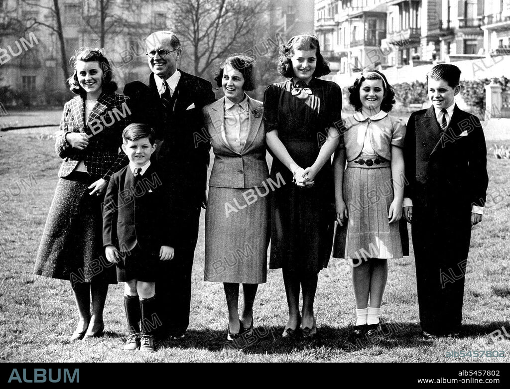 U.S. Ambassador And Family In London.The Kennedy family facing the camera (L to R) Kathleen; Mr. Kennedy; Mrs. Kennedy; Patricia; Jeanne; Robert and (in front) Edward.Last night Mr. Joseph Kennedy, the new American Ambassador to London went down, to Plymouth to meet his wife and five of his nine children off that Washington, from America. The remainder of the family are still in America Today the Ambassador and his wife were settling down at the American Embassy in London. March 16, 1938. (Photo by Keystone).