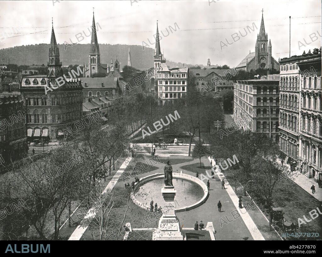 Victoria Square, Montreal, Canada, 1895. The square, originally laid out in 1813 and formerly known as Place du Marché-à-Foin, was renamed for Queen Victoria in 1860. From "Round the World in Pictures and Photographs: From London Bridge to Charing Cross via Yokohama and Chicago". [George Newnes Ltd, London, 1895].