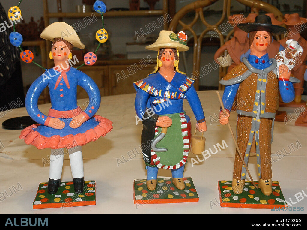 Crafts. Bonecos of Estremoz. Ceramic figures representing different professions. Portugal.