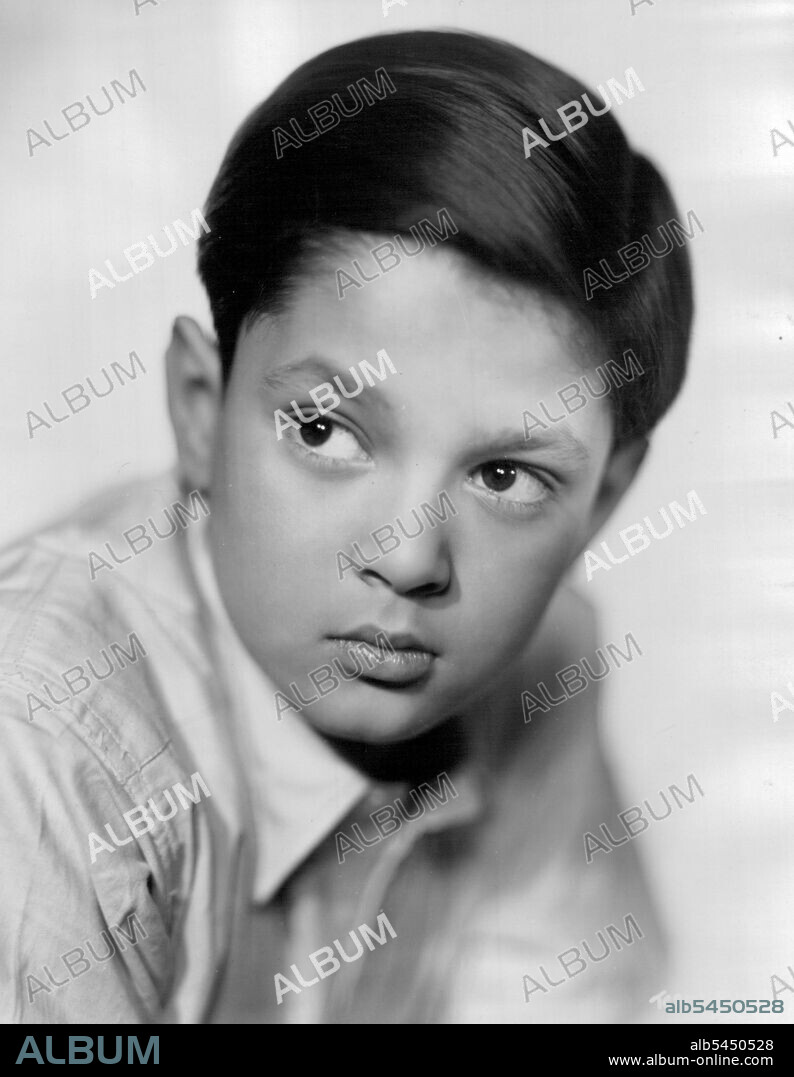 Dark-eyed, 12-year-old Jeremy Spenser has his first starring role as an Italian boy conductor in Prelude To Fame. He has made five previous film appearances in small parts in Anna Karenina, Kind Hearts And Coronets, The Dancing Years, The Spider and The Fly and Portrait of Clare.***** Prelude To Fame co-stars Guy Rolfe and Kathleen Byron with Kathleen Ryan. The film is produced by Donald Wilson and directed by Fergus McDonell. January 10, 1950. (Photo by Wilfred Newton, The J. Arthur Rank Organisation Ltd.).