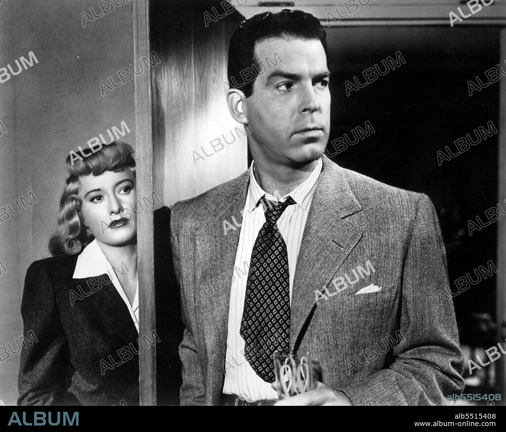 BARBARA STANWYCK and FRED MACMURRAY in DOUBLE INDEMNITY, 1944, directed by BILLY WILDER. Copyright PARAMOUNT PICTURES.