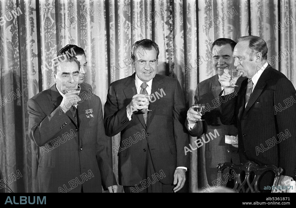 U.S. President Richard Nixon with (left to right) Soviet leader Leonid Brezhnev, Soviet Minister of Foreign Affairs Andrei Gromyko, and Secretary of State William P. Rogers, toasting the signing of Agreements between the two Countries on Oceanography, Transportation and Cultural Exchange, Washington, D.C., USA, Warren K. Leffler, June 19, 1973.