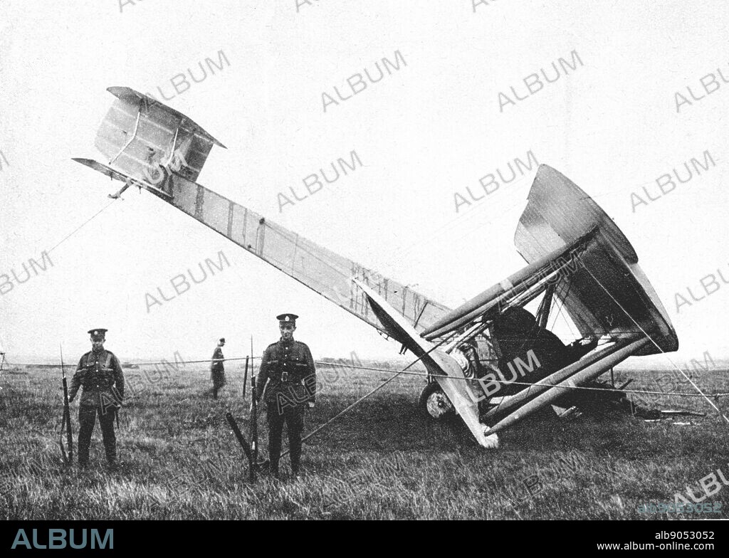 John William Alcock (1892-1919) and Arthur Whitten Brown (1886-1948) British aviators. First men to fly Atlantic non-stop, 14 June 1919. Their Vickers-Vimy-Rolls bomber in the bog where they landed being guarded by British troops.