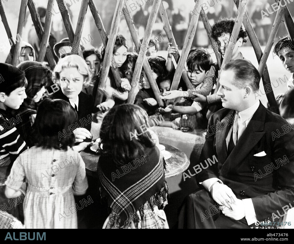 MADELEINE CARROLL and REGINALD DENNY in BLOCKADE, 1938, directed by WILHELM DIETERLE. Copyright UNITED ARTISTS.