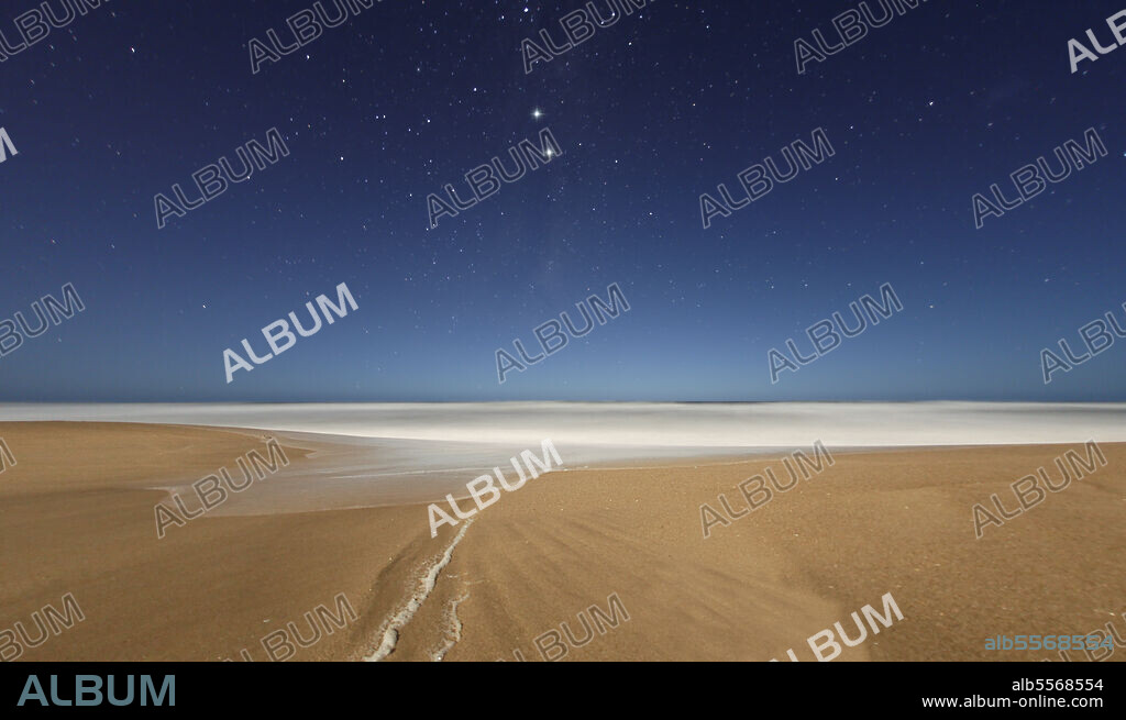 Alpha and Beta Centauri (the pointers) seen from the beach in Miramar, Argentina. Alpha is the star system closest to our Sun.