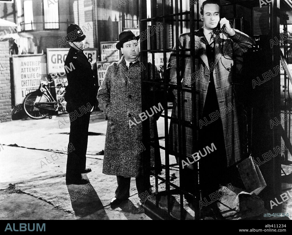 Cameo, ALFRED HITCHCOCK y GEORGE SANDERS. ALFRED HITCHCOCK y GEORGE SANDERS en REBECA, 1940 (REBECCA), dirigida por ALFRED HITCHCOCK. Copyright Selznick International Pictures.