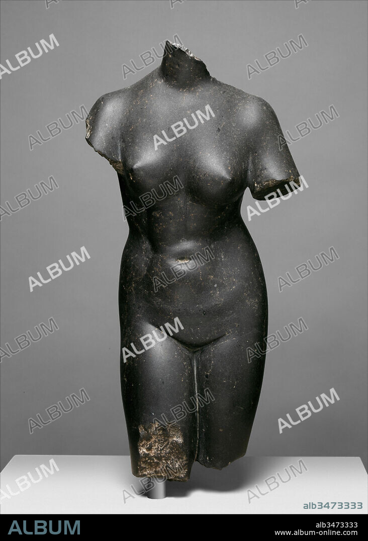 Basalt statue of Aphrodite, Imperial, late 1st–early 2nd century A.D., Roman, Basalt, 16 5/8in. (42.2cm), Stone Sculpture, Adaptation of a Greek statue of the 3rd century B.C. known as the Medici Aphrodite. The Romans used colored stones for floors, wall revetment, and sculpture. This basalt version of a popular statue type for Aphrodite may have been intended to evoke the darkness of bronze.
