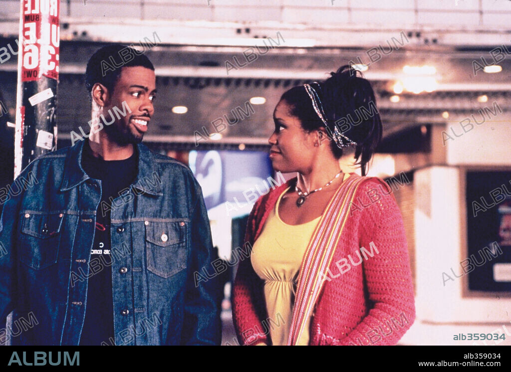 CHRIS ROCK y REGINA KING en DOWN TO EARTH: DE VUELTA A LA TIERRA, 2001 (DOWN TO EARTH), dirigida por CHRIS WEITZ y PAUL WEITZ. Copyright PARAMOUNT PICTURES / LEE, DAVID.