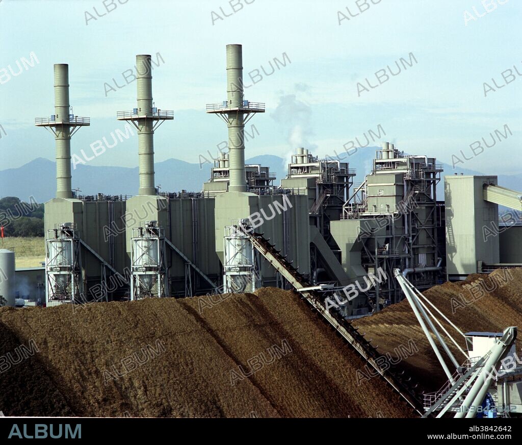 This 50 megawatt biomass power plant located in Anderson, California, runs on residues produced by nearby companies in the forest products industry. The growth and harvesting of trees can, in the future, provide a replenishable source of fuel for electricity generation. This 50 megawatt station currently burns wood chips prepared from wood waste directly. A gasifier that will use the fuel more cleanly and more efficiently is presently being tested. Biomass is biological material derived from living, or recently living organisms. It most often refers to plants or plant-based materials which are specifically called lignocellulosic biomass. As an energy source, biomass can either be used directly via combustion to produce heat, or indirectly after converting it to various forms of biofuel. Conversion of biomass to biofuel can be achieved by different methods which are broadly classified into: thermal, chemical, and biochemical methods.
