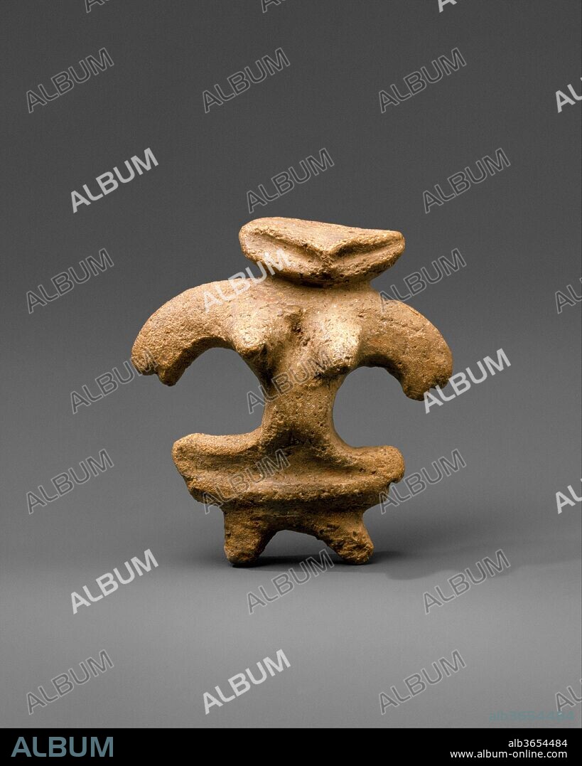 Dogu (Clay Figurine). Culture: Japan. Dimensions: H. 2 1/4 in. (5.7 cm); W. 1 7/8 in. (4.8 cm).
Clay figurines (dogu) of humans and animals were made throughout the Jomon period, particularly during the latter half, and establish the beginnings of Japan's sculptural tradition. The largest percentage of these figures, including this statuette from northern Honshu, comprises highly stylized females with enlarged breasts, hips, and stomachs presumed to have been fertility symbols.
Because some of these figurines appear to have been broken intentionally, it has been hypothesized that they were used in rituals meant to cure physical ailments. It seems that once the affliction was ceremonially transferred to the figure, the clay image was discarded. This speculation would explain why most dogu are found scattered around or in refuse heaps rather than in graves.