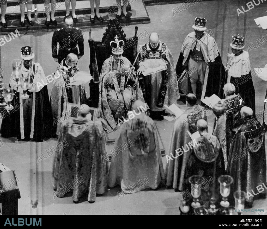 The Coronation of King George VI. And Queen Elizabeth -- The crowned King George VI seated on the Coronation Chair in Westminster Abbey during the ceremony. May 12, 1937. (Photo by The "Topical" Press Agency Ltd.).