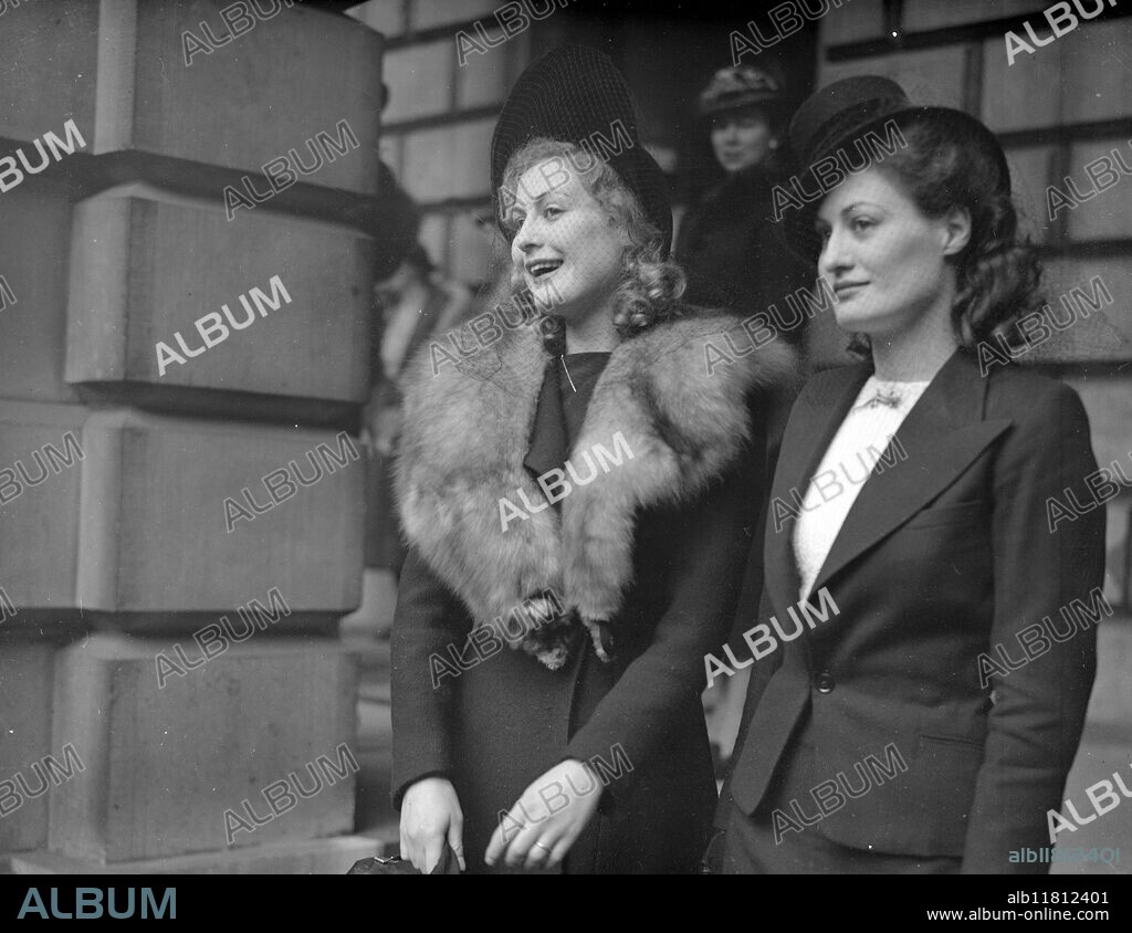 Private Views Day at the Royal Academy of Arts in Burlington House on Piccadilly , London , England. Miss Rae Fuller, the model ( left , one of " Mermaids " for New Trafalgar Square Fountain). 3 May 1940.