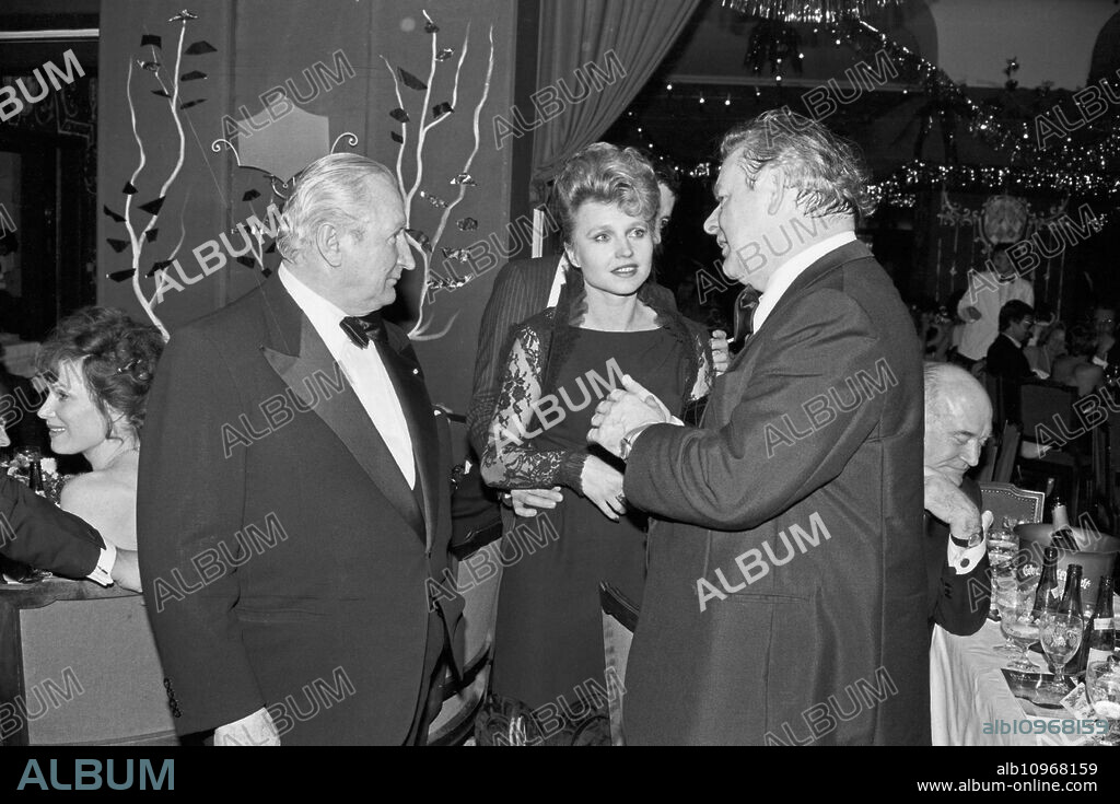 German actress Hanna Schygulla with producer Luggi Waldleitner (left) at the Deutscher Filmball on January 11th 1981 at Munich, Germany 1980s.