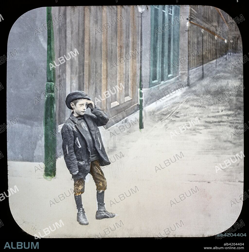 Magic lantern slide circa 1900.Victorian/Edwardian.Social History. Mrs Isabel Reaney story of Willie Wills Wings and slide show a christian story . Life model painted background. Slide 25 For many hours he trudged those city streets.