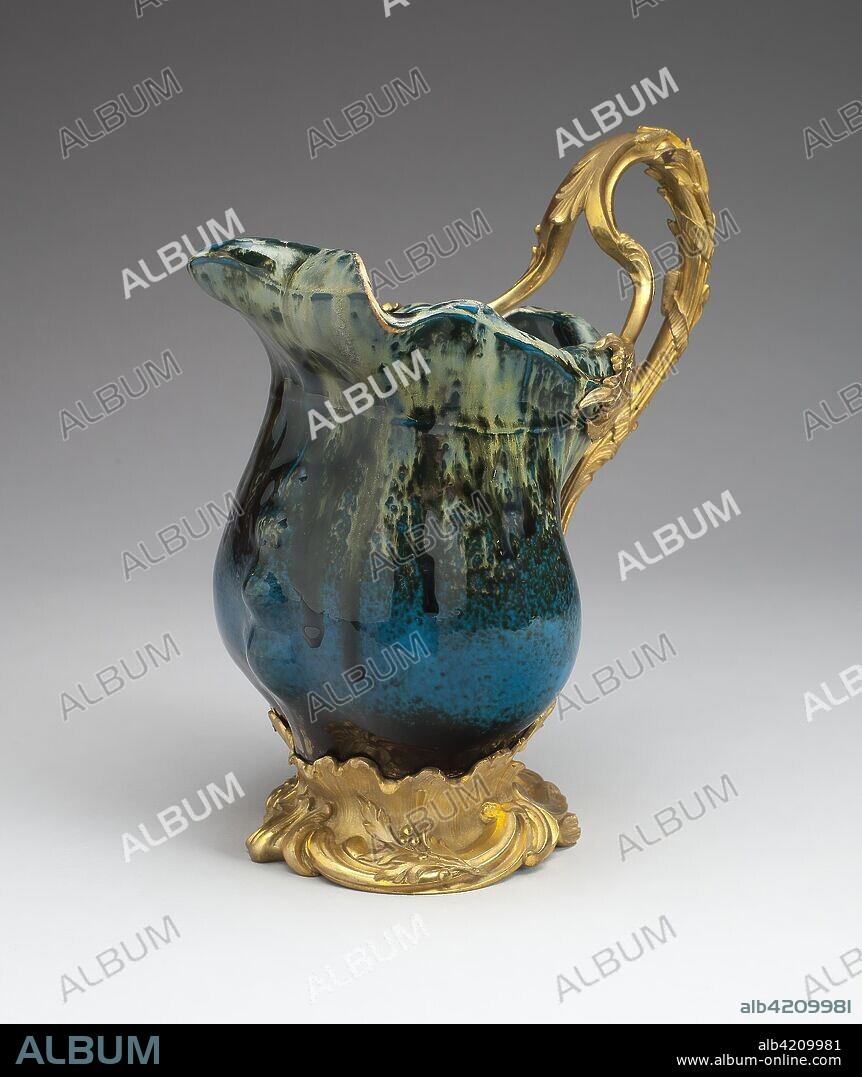 AGATHON LEONARD. Ewer. Léonard-Agathon van Wydeveld (French, born Belgium, 1841-1923); Designed and made by Louchet Frères (French, active 19th century). Date: 1898. Dimensions: 27.3 × 25 cm (10 3/4 × 9 7/8 in.). Flambé-glazed pottery and gilt bronze mounts. Origin: France.