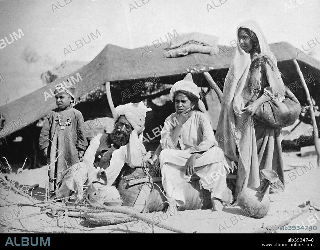 Three generations of Brahui nomads, East Balochistan, 1902. From The Living Races of Mankind, Vol. I. [Hutchinson & Co, London, 1902].