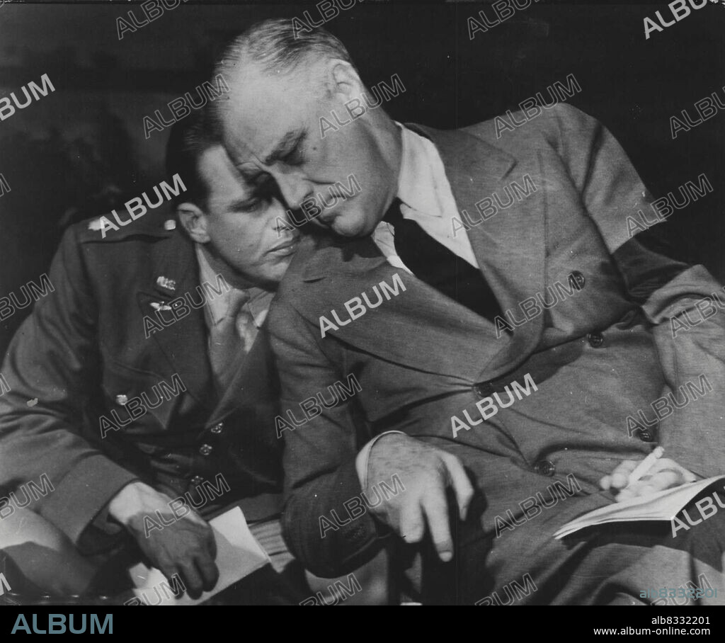 President Roosevelt Talks With His Son At Casablanca.President Franklin D. Roosevelt talks with his son, Lt. Col. Elliott Roosevelt, during the historic Allied conference at Casablanca. Lt, Col, Roosevelt is attached to a photographic unit of the U.S. Army Air Forces operating in North Africa. March 29, 1943. (Photo by Interphoto News Pictures, Inc.).