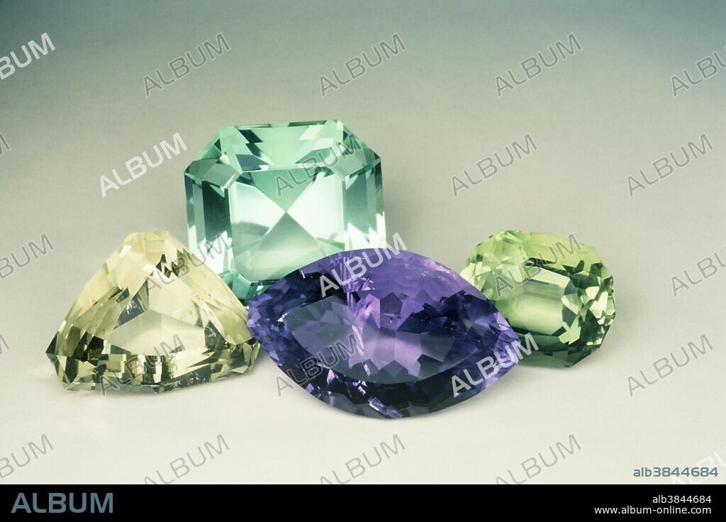 Fluorite (calcium fluoride) is a very common mineral in ore deposits and sedimentary rocks throughout the world. It forms excellent and spectacular crystals, sometimes quite large, and impurities create a wide range of colors. Color banding is often present. Faceted gems over 1,000 carats have been cut. These stones range from about 38 to 153 carats.