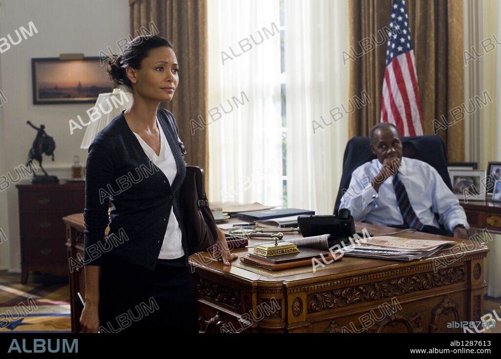 DANNY GLOVER and THANDIWE NEWTON in 2012, 2009, directed by ROLAND EMMERICH. Copyright COLUMBIA PICTURES.