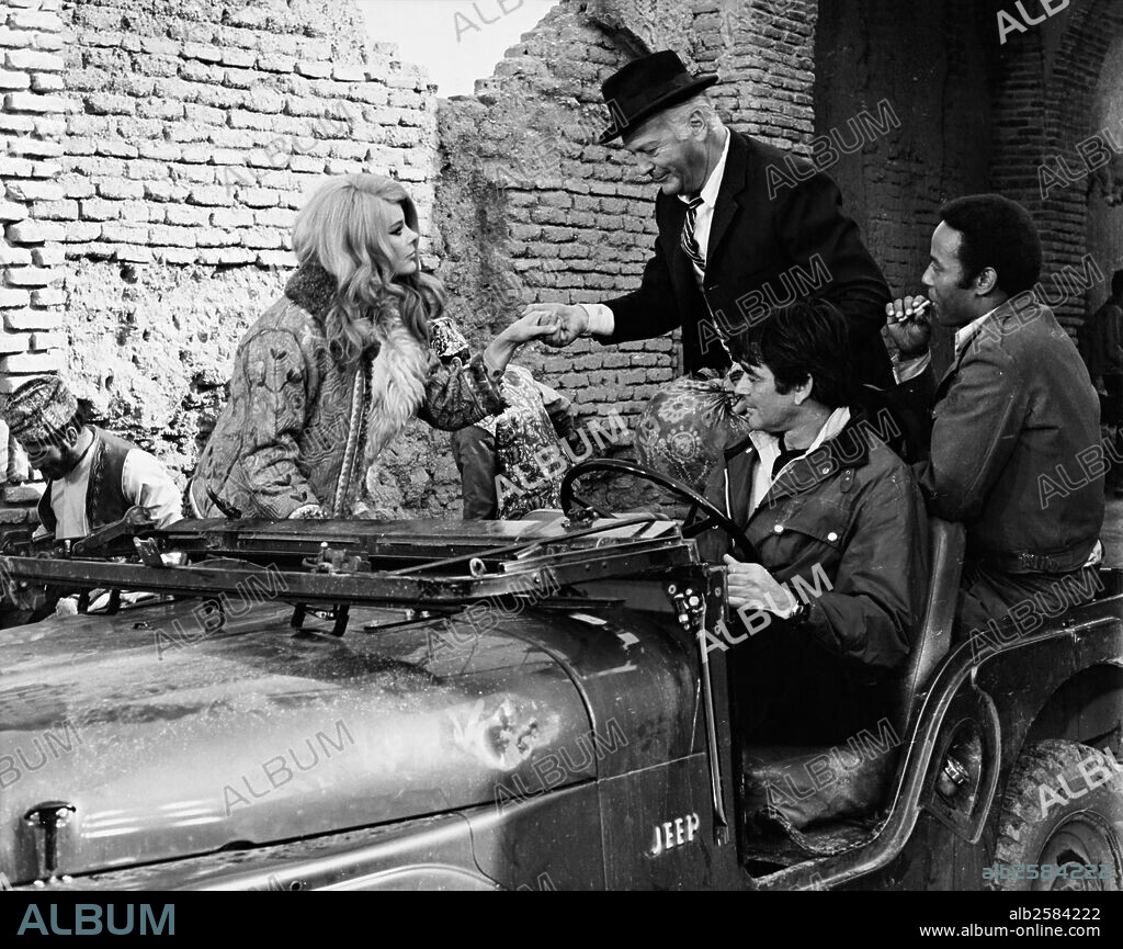 Curd Jurgens, ELKE SOMMER and STUART WHITMAN. CURD JüRGENS, ELKE SOMMER and STUART WHITMAN in THE INVINCIBLE SIX, 1970, directed by JEAN NEGULESCO. Copyright PARAMOUNT PICTURES.