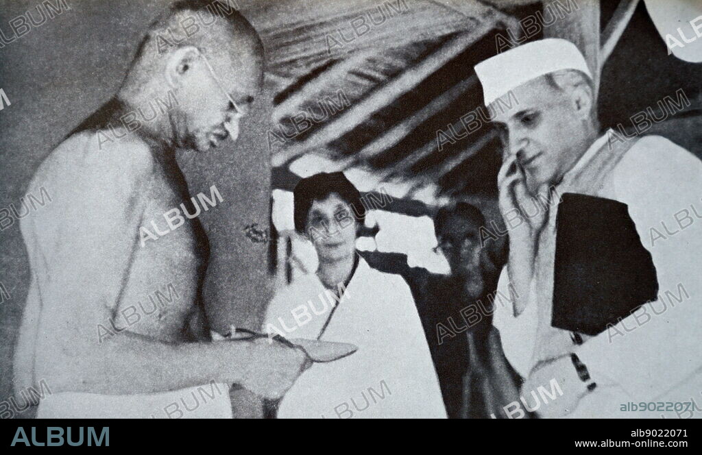 Mahatma Gandhi and Jawaharlal Nehru, at Sevagram a village in the state of Maharashtra, India. Mohandas Gandhi (1869 1948) was the preeminent leader of the Indian independence movement in British-ruled India. Nehru (1889-1964 was the First Prime Minister of India in 1948. Sevagram was the place of Mohandas Gandhi's ashram and his residence from 1936 to his death in 1948.
